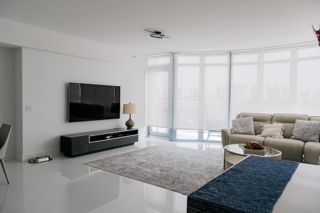 living room with a wall of windows