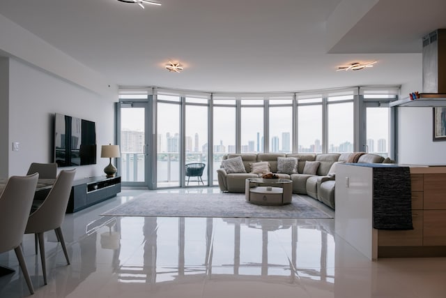 living room featuring floor to ceiling windows