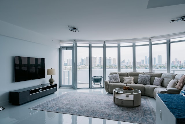 living room featuring floor to ceiling windows