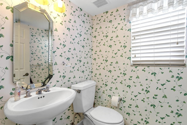 bathroom with sink and toilet