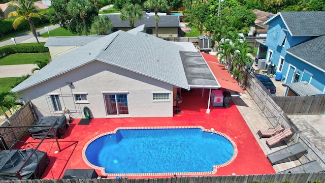 view of pool featuring a patio area