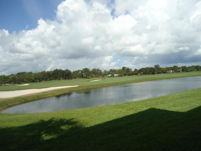2421 Village Blvd Unit 102, West Palm Beach, FL 33409 - water view with a local golf course