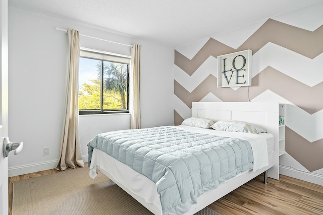 bedroom featuring light hardwood / wood-style flooring