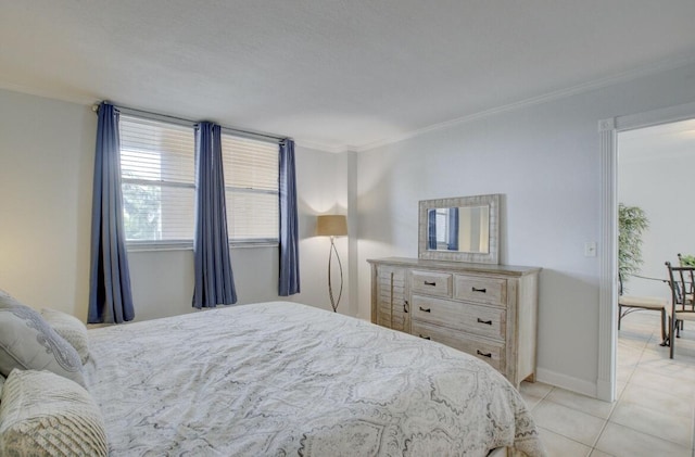 bedroom featuring ornamental molding and light tile patterned flooring