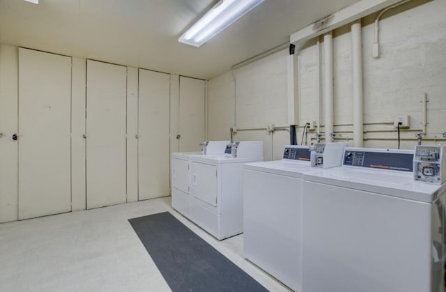 laundry area with washing machine and dryer