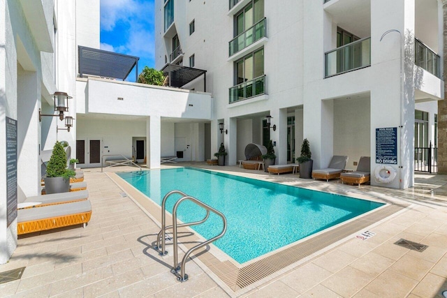 community pool featuring a patio