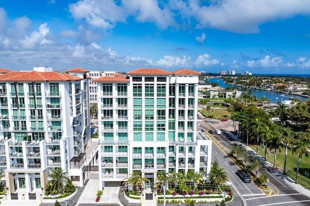 view of building exterior with a water view