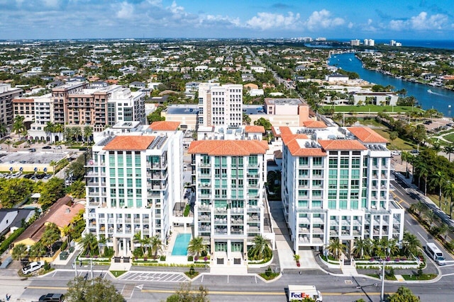 aerial view with a water view and a city view