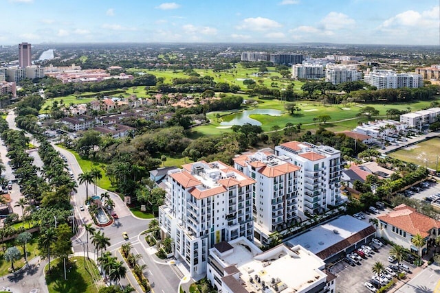 bird's eye view featuring a view of city and a water view