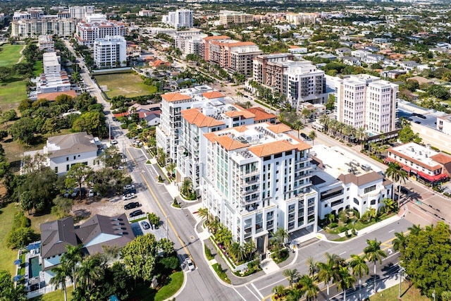 birds eye view of property featuring a city view