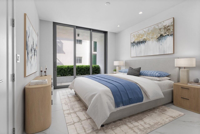 bedroom featuring marble finish floor, a wall of windows, recessed lighting, and access to exterior