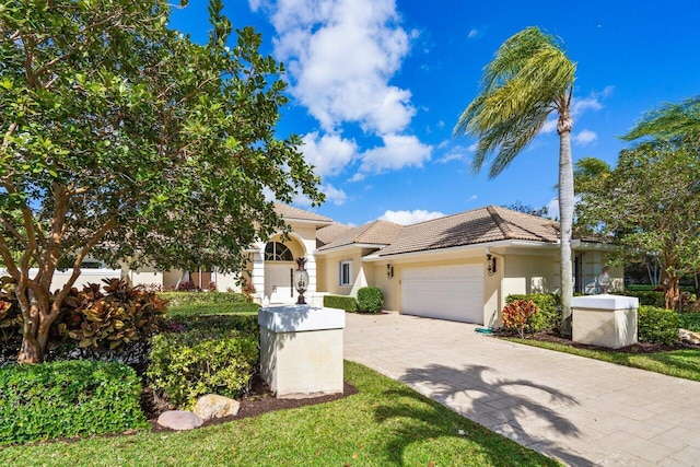 view of front of house with a garage