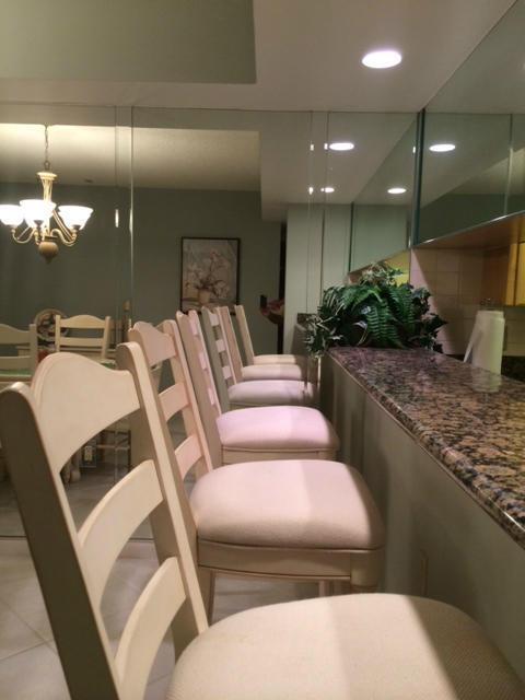 2461 Village Blvd Unit 101, West Palm Beach, FL 33409 - full bathroom featuring vanity and a shower stall
