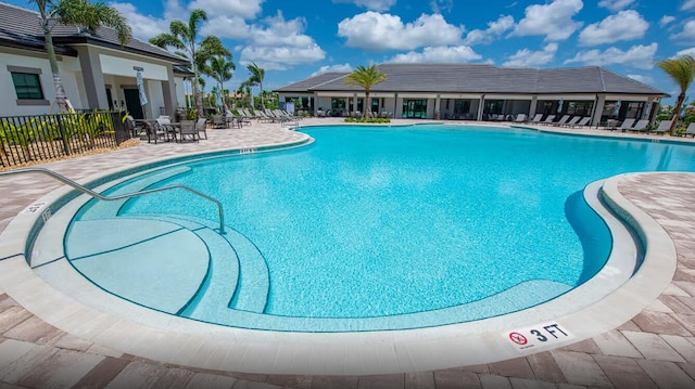 view of pool featuring a patio area