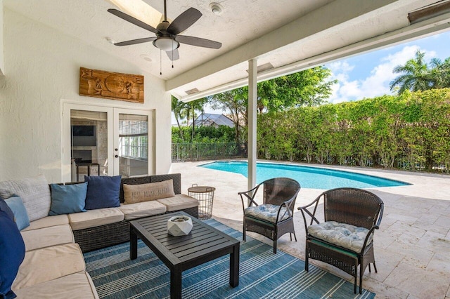 view of patio / terrace featuring ceiling fan, fence, an outdoor hangout area, and a fenced in pool