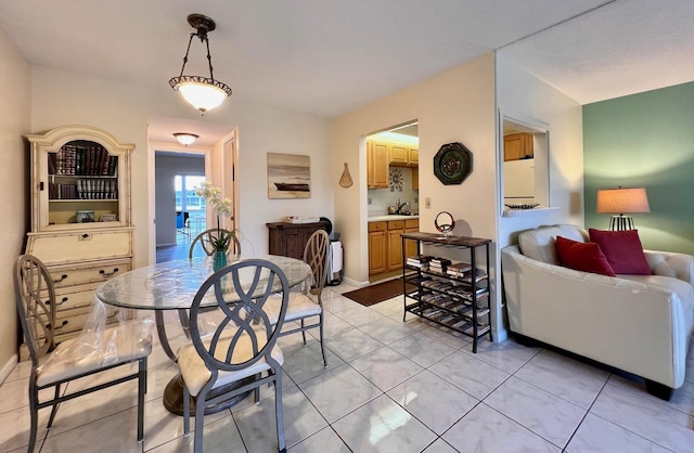 dining space with light tile patterned flooring