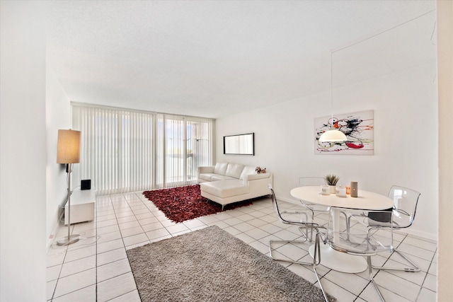 living room with tile patterned flooring