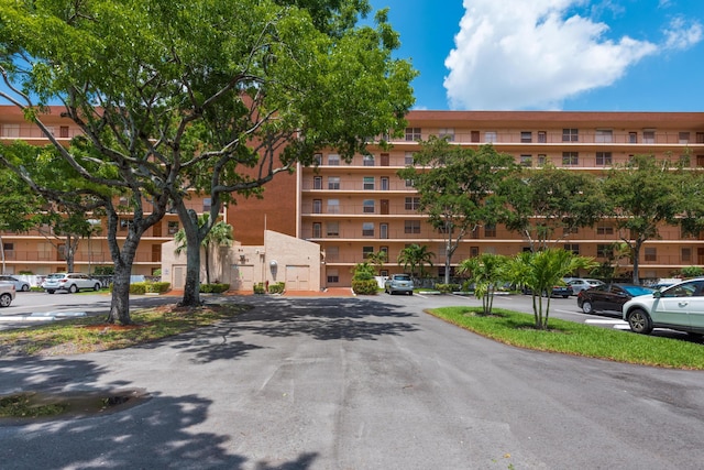 14623 Bonaire Blvd Unit 605, Delray Beach, FL 33446 - view of apartment building / complex featuring uncovered parking