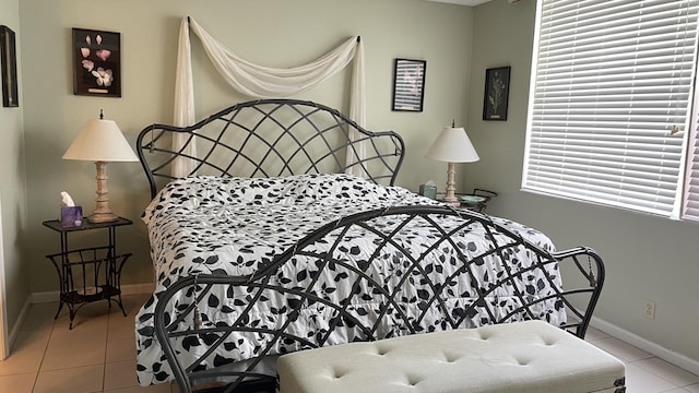 14623 Bonaire Blvd Unit 605, Delray Beach, FL 33446 - tiled bedroom featuring baseboards