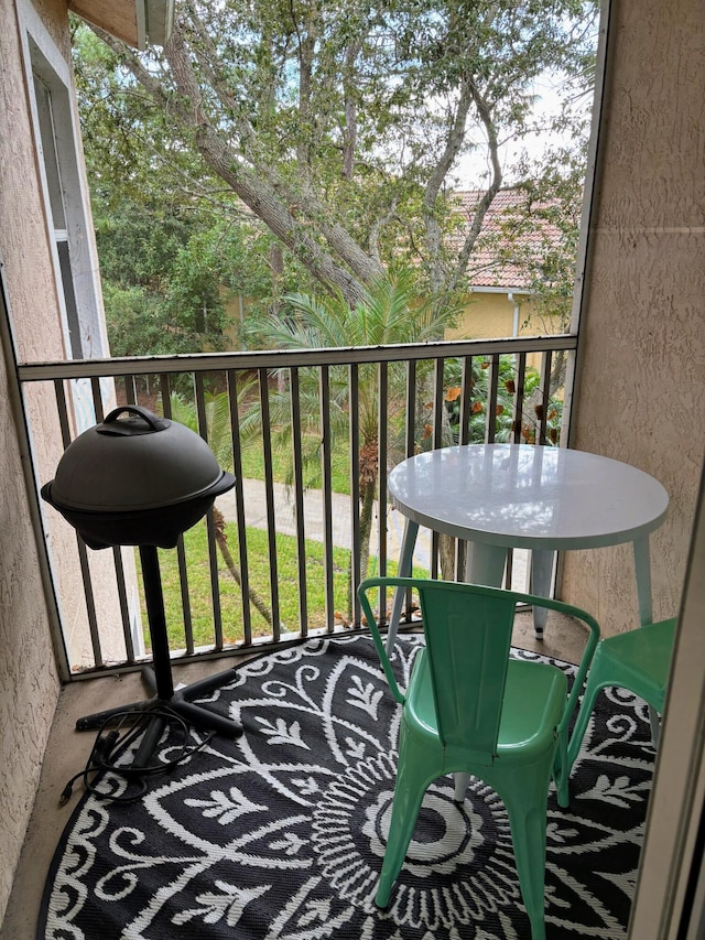 balcony featuring area for grilling