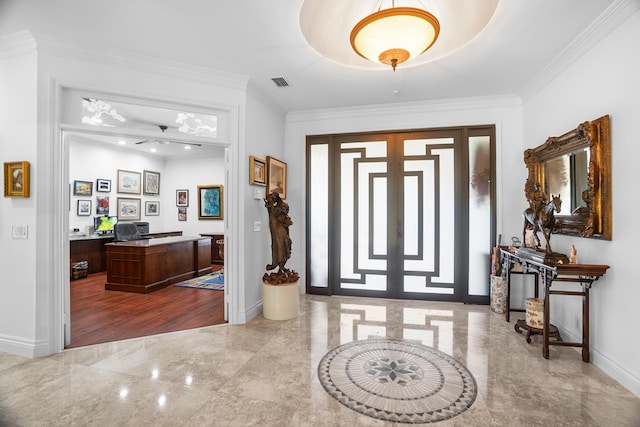 foyer featuring visible vents, crown molding, baseboards, french doors, and marble finish floor