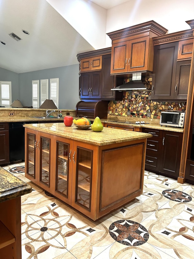 kitchen with light stone counters, tasteful backsplash, black electric cooktop, a kitchen island, and wall chimney range hood