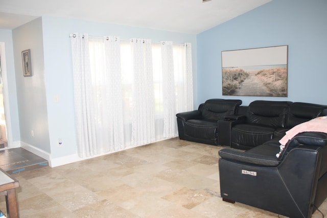 living room with lofted ceiling