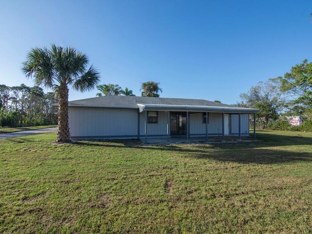 single story home with a patio and a front yard