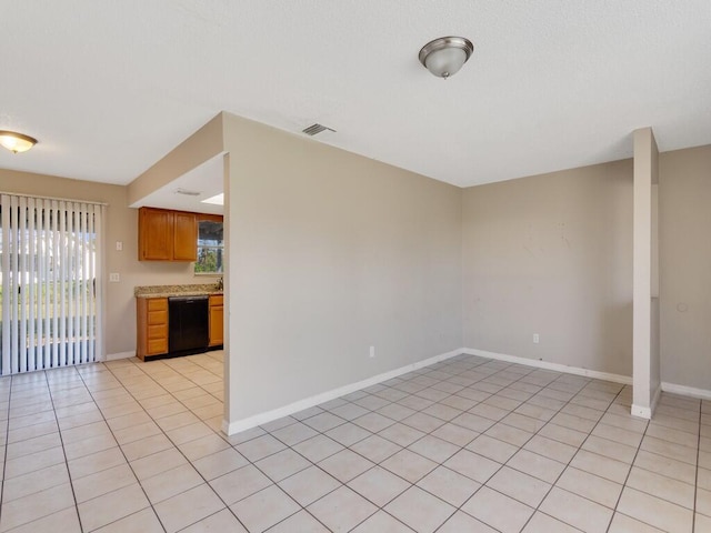 view of tiled spare room