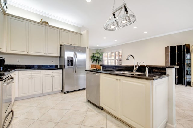 kitchen featuring a kitchen island with sink, sink, ornamental molding, and appliances with stainless steel finishes