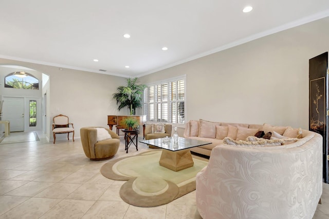 tiled living room featuring crown molding