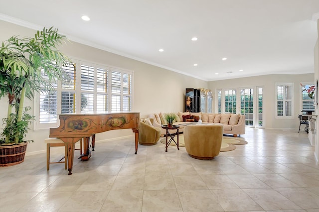 living room featuring ornamental molding, a healthy amount of sunlight, and light tile patterned flooring