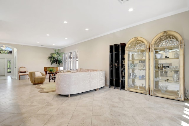 tiled living room featuring ornamental molding