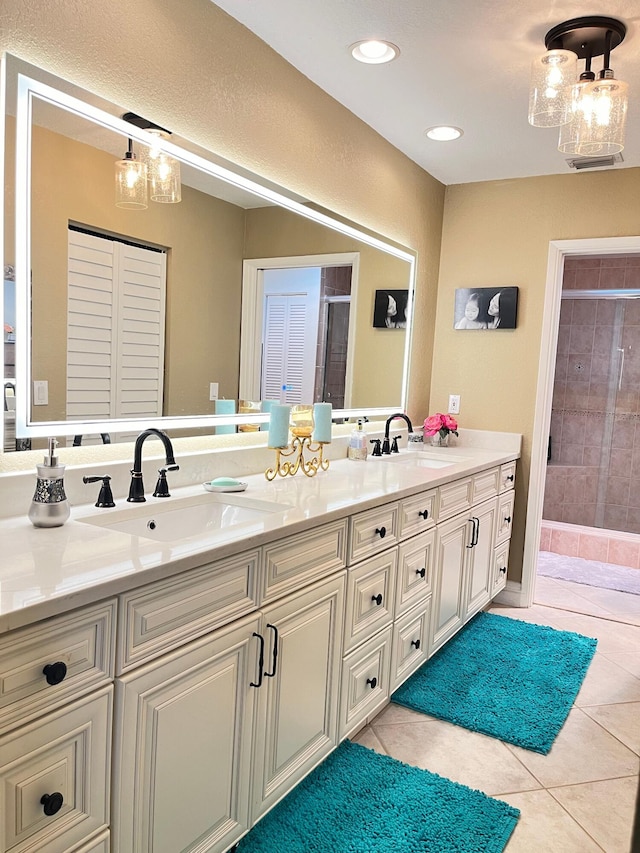 7895 La Mirada Dr, Boca Raton, FL 33433 - full bath with tile patterned flooring, a sink, double vanity, and a stall shower
