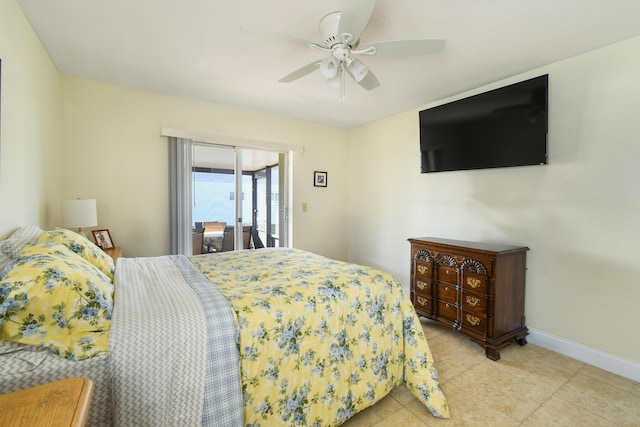 bedroom featuring light tile patterned floors, access to exterior, baseboards, and a ceiling fan