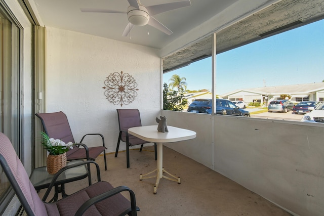 balcony featuring ceiling fan