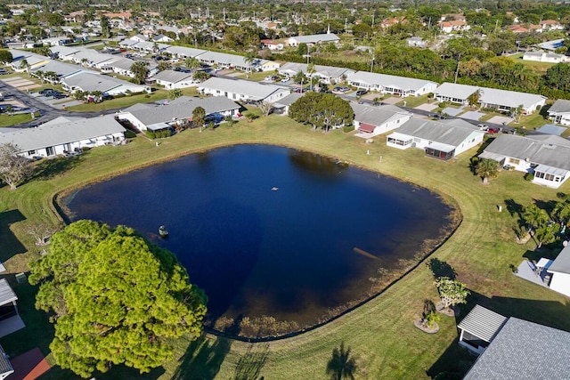 bird's eye view with a water view and a residential view