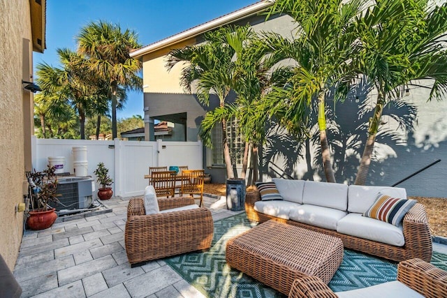 view of patio with an outdoor hangout area and central air condition unit