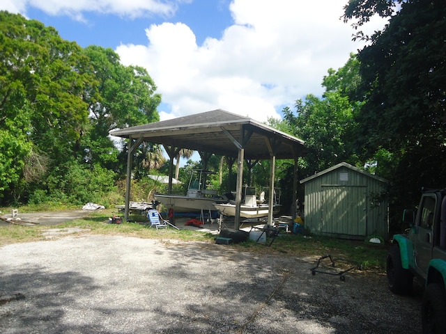 exterior space with an outbuilding, a gazebo, and a storage unit