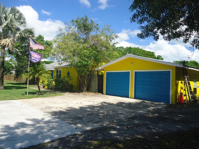 detached garage with fence