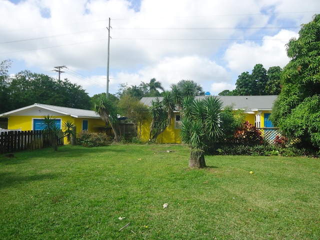 view of yard with fence