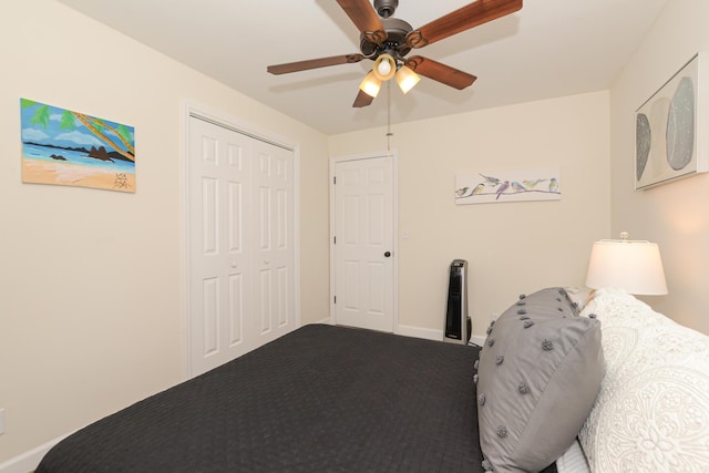 unfurnished bedroom featuring ceiling fan, carpet flooring, and a closet