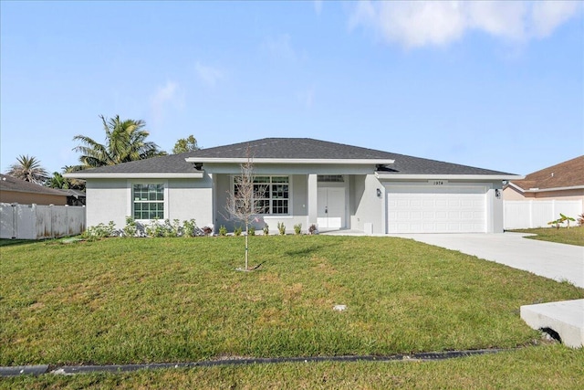 ranch-style house featuring a garage and a front yard