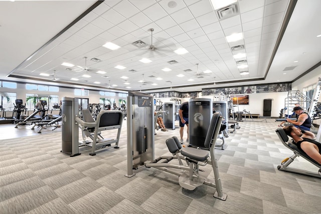 workout area featuring light carpet and visible vents