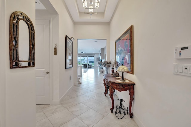 11877 SW Waterford Isle Way, Port Saint Lucie, FL 34987 - hallway featuring light tile patterned flooring and baseboards
