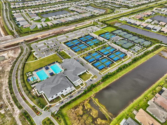 birds eye view of property with a residential view