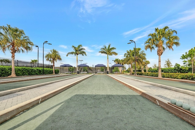 view of street featuring street lighting and sidewalks