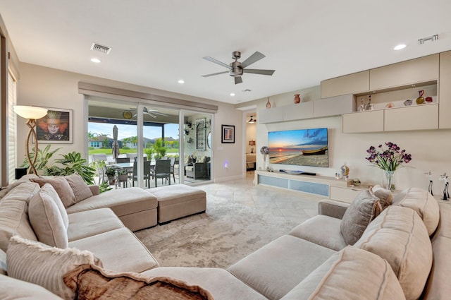 11877 SW Waterford Isle Way, Port Saint Lucie, FL 34987 - living area featuring light tile patterned floors, visible vents, recessed lighting, and a ceiling fan