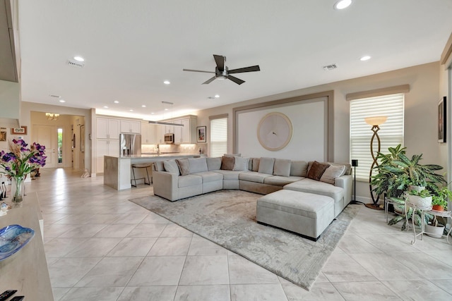 11877 SW Waterford Isle Way, Port Saint Lucie, FL 34987 - living area featuring a ceiling fan, recessed lighting, light tile patterned floors, and visible vents