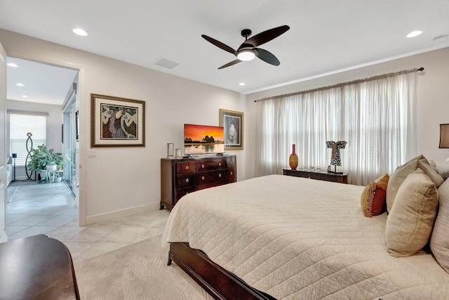 bedroom with recessed lighting, ceiling fan, baseboards, and light tile patterned floors